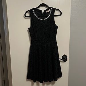 Beautiful jacquard velvet print black dress with beading at necklaces on